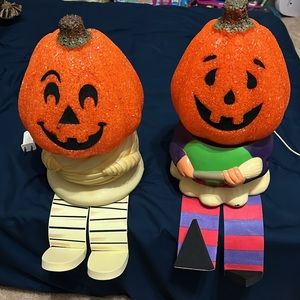 2 Light-up Pumpkins on Pedestals